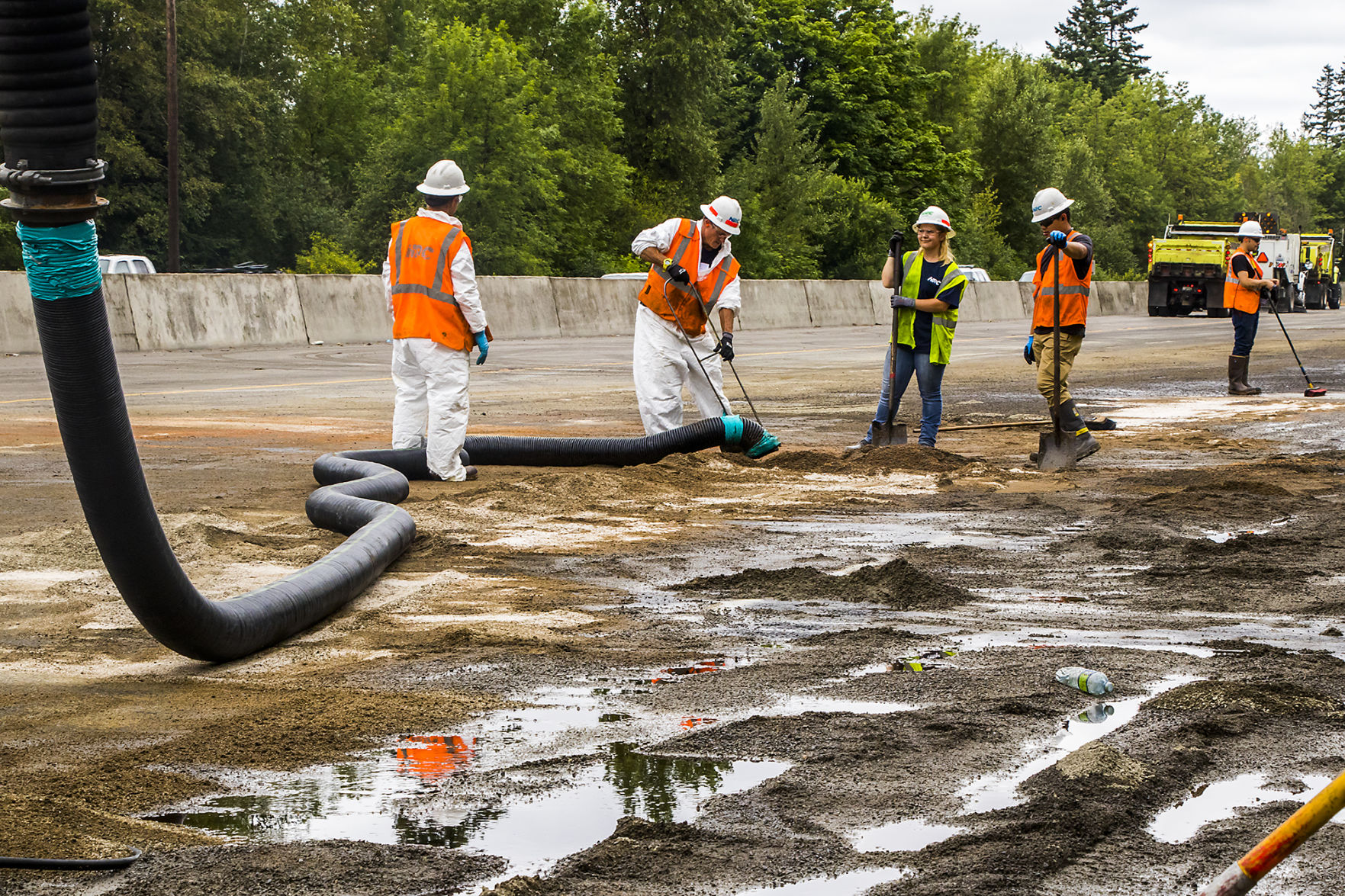 Crews Work To Clean Up Oil After Tanker Overturned